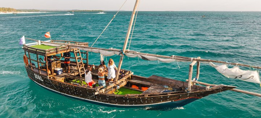 Mnemba Island Full Day Dhow Snorkeling Trip with Drinks and Lunch
