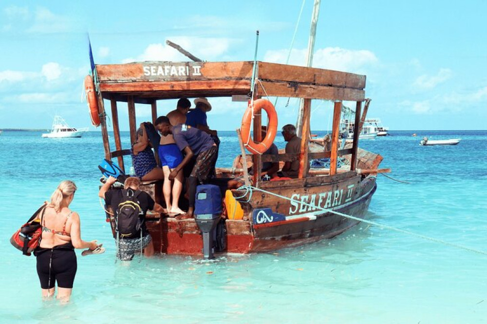 Mnemba Island Full Day Dhow Snorkeling Trip with Drinks and Lunch