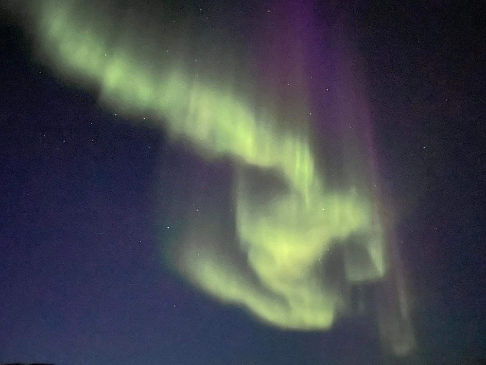 Arctic Night Snowmobile Adventure Chasing Northern Lights in Ilulissat