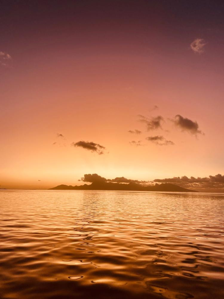 Private Sunset Lagoon Cruise with Champagne & Swimming in Tahiti