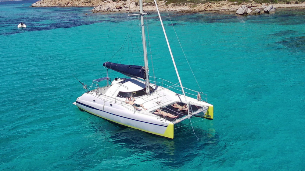 From Olbia: Catamaran Tour between Tavolara and Cala Moresca