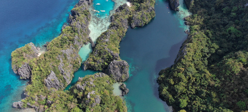 Private Silent Lagoon & Cadlao Island Beaches Tour with Outrigger