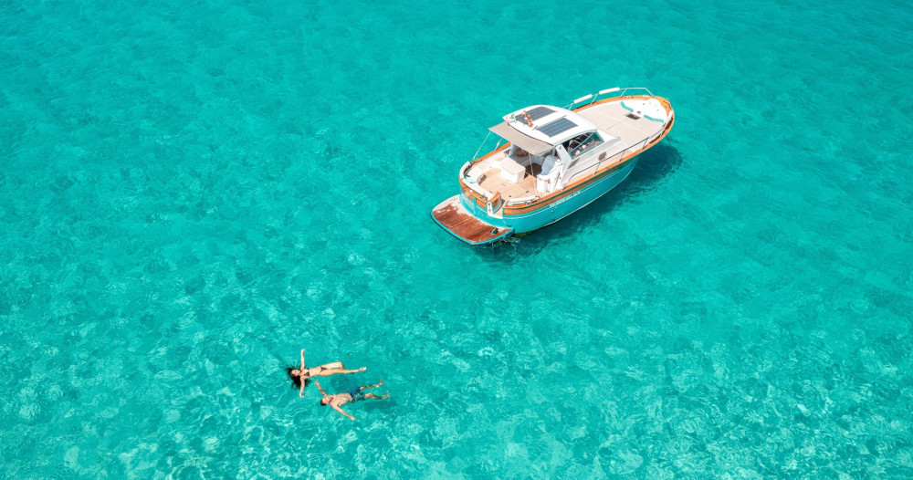 Hybrid Boat Tour with Swimming & Aperitif on Sardinia’s Costa Smeralda