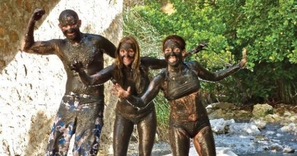 Tout Bagay Catamaran Tour with Waterfall + Pitons + Mud Bath