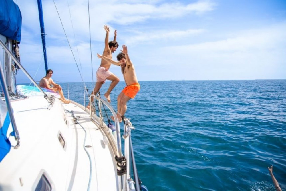 Fun in the Sun: 2.5 Hours of Sailing, Inflatables & Swimming in Barcelona