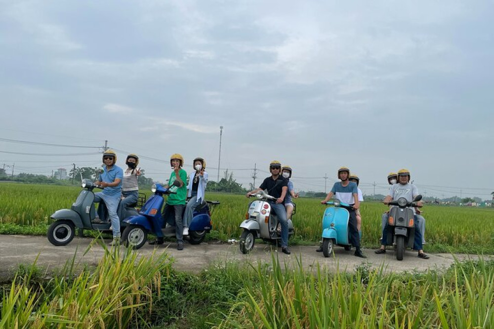 Exploring Vespa Tour Through Little Red River Delta
