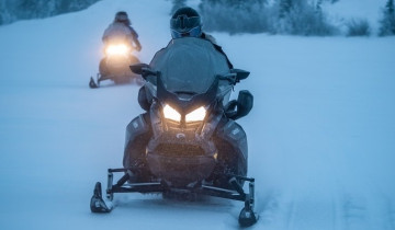 A picture of Overnight Snowmobile Adventure with Riverside Cabin & Sauna