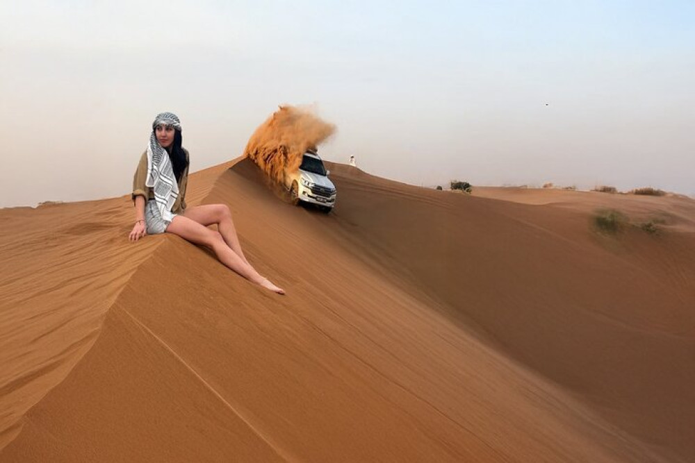 Evening Desert Safari Camel, Falcon, Sandboarding BBQ & Shows