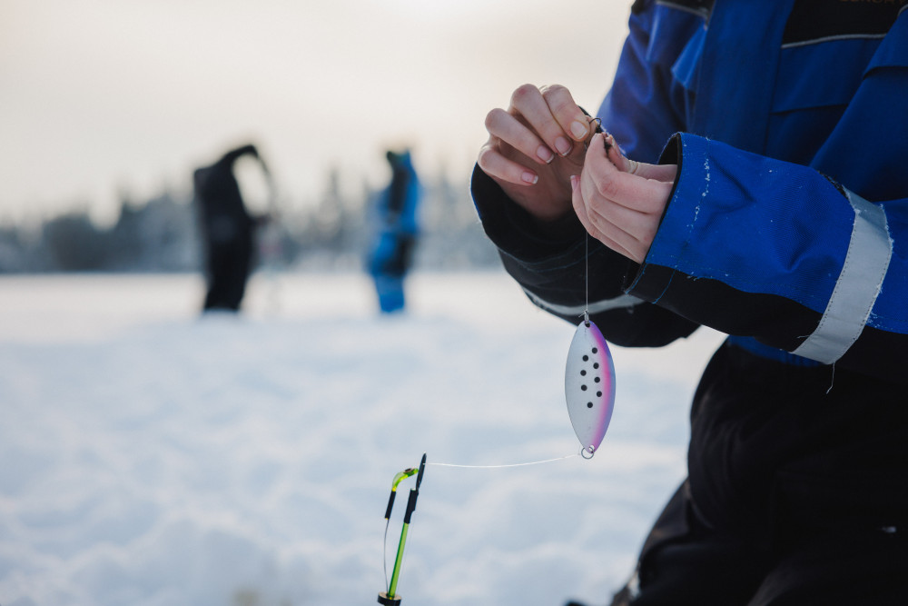 Snowmobile Safari and Traditional Ice Fishing Adventure in Levi