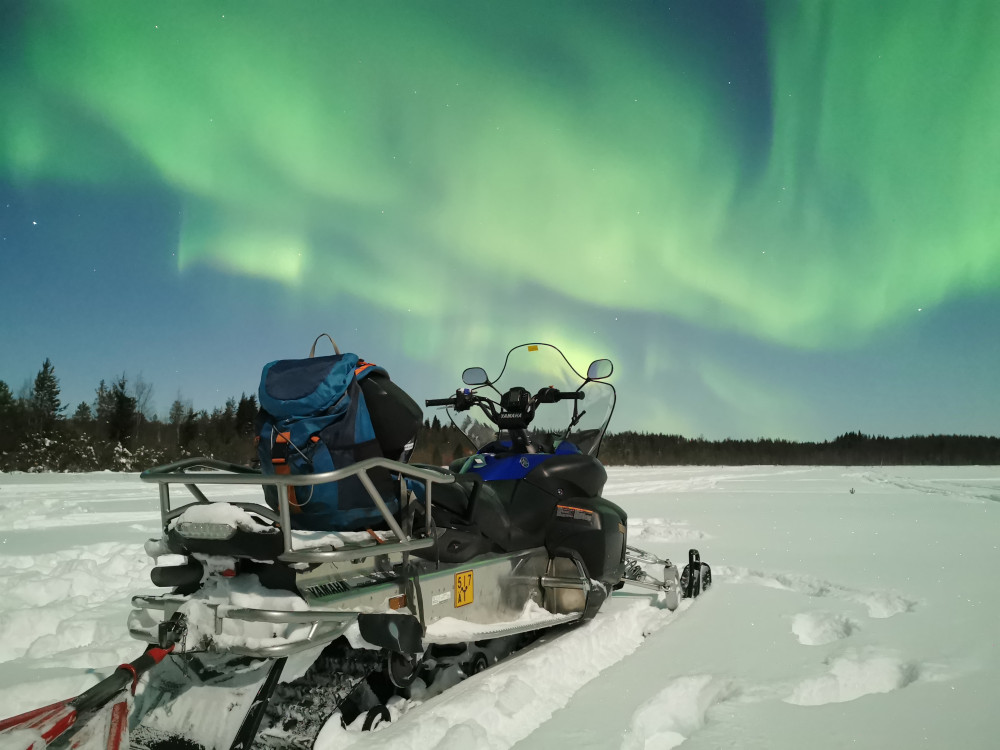 Northern Lights Hunting Tour by Snowmobile in Levi