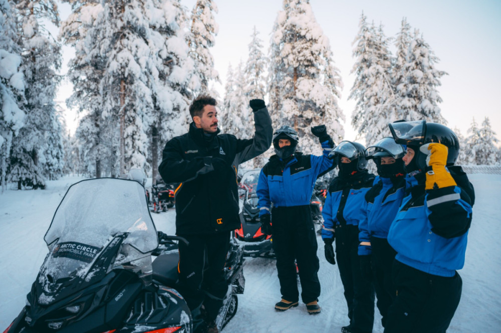 Snowmobile Adventure to Lainio Snow Village with Lunch from Levi