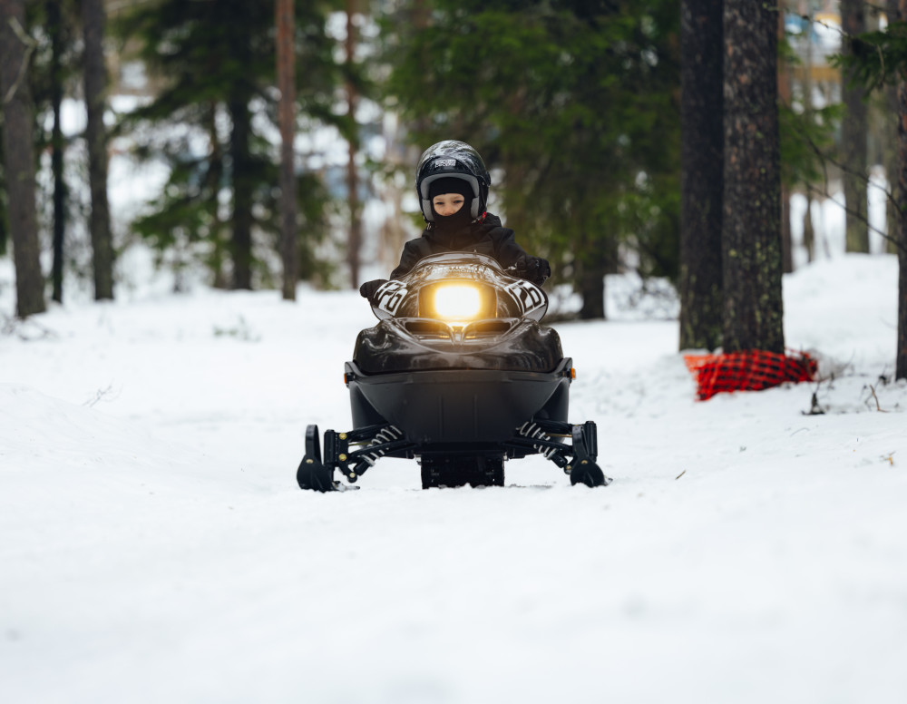 Family Snowmobile Safari with Kids’ Mini Snowmobiles in Levi