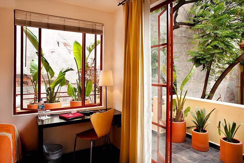 Quiet and picturesque, the Red Treehouse Treehouse Room is a great place to stay in Mexico City for solo travelers