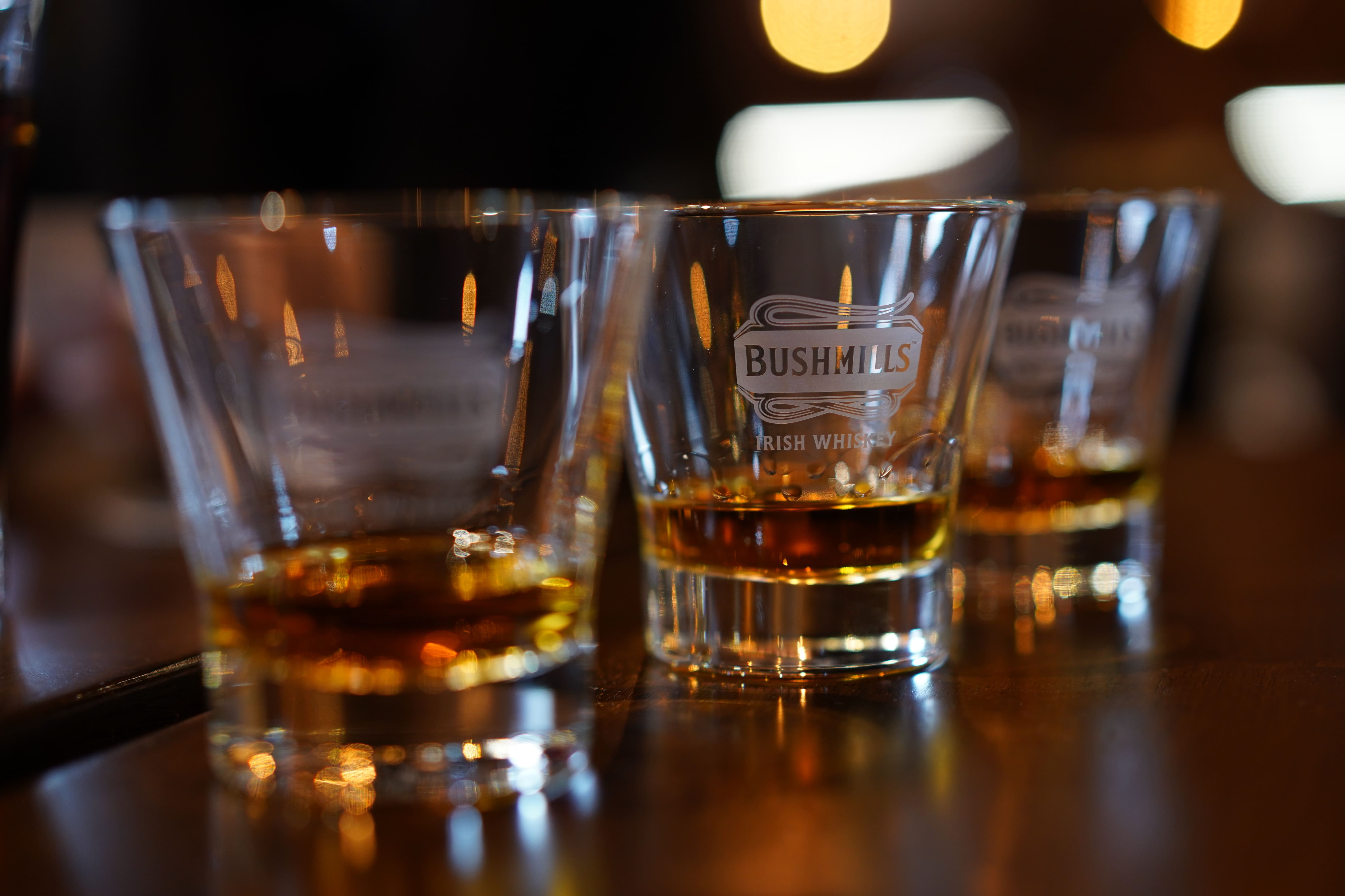 Sipping whiskey at Bushmills Distillery is one of the coolest things to do in Ireland